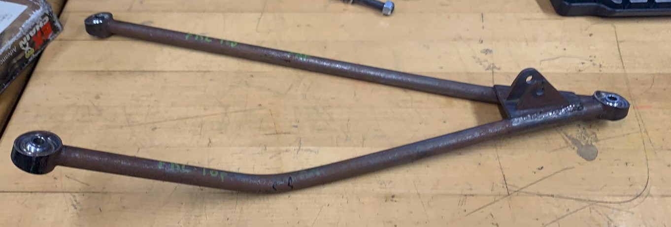 A broken lower wishbone from a formula Sae car